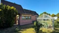 Garten mit Gewächshaus1